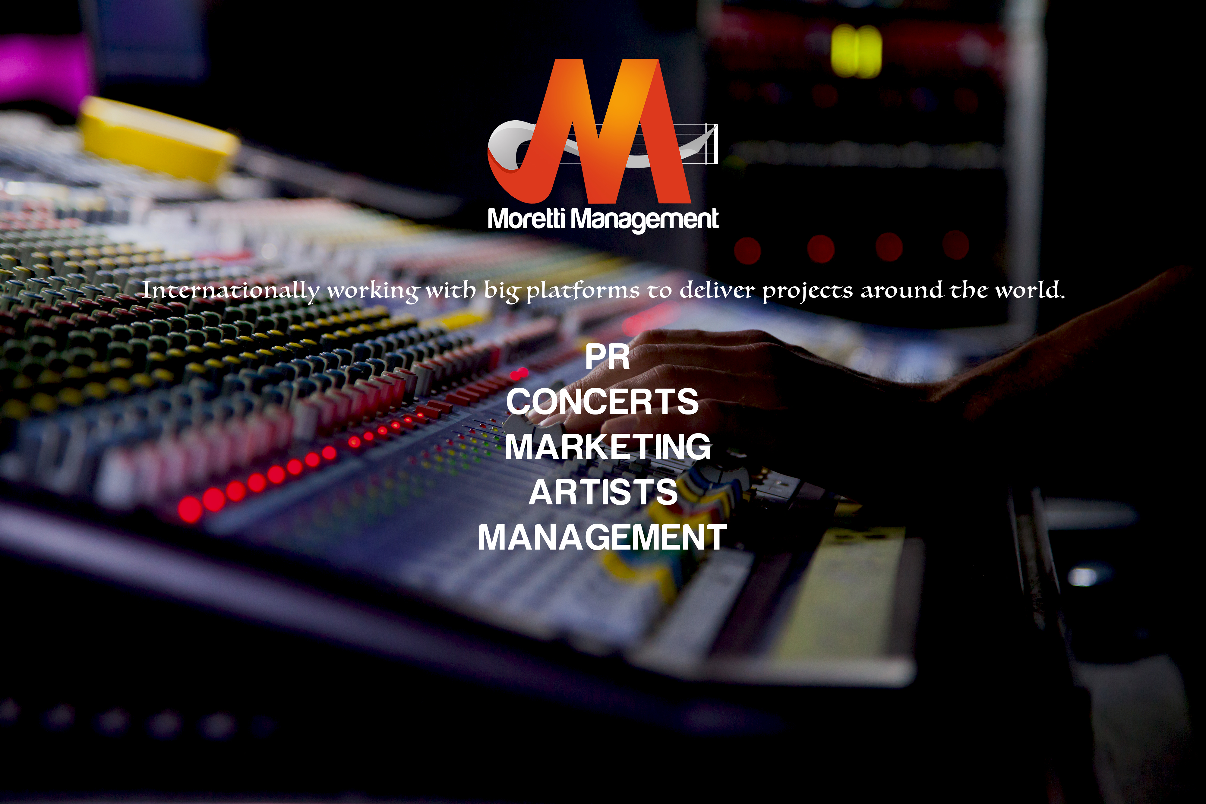 Soundman working on the mixing console.