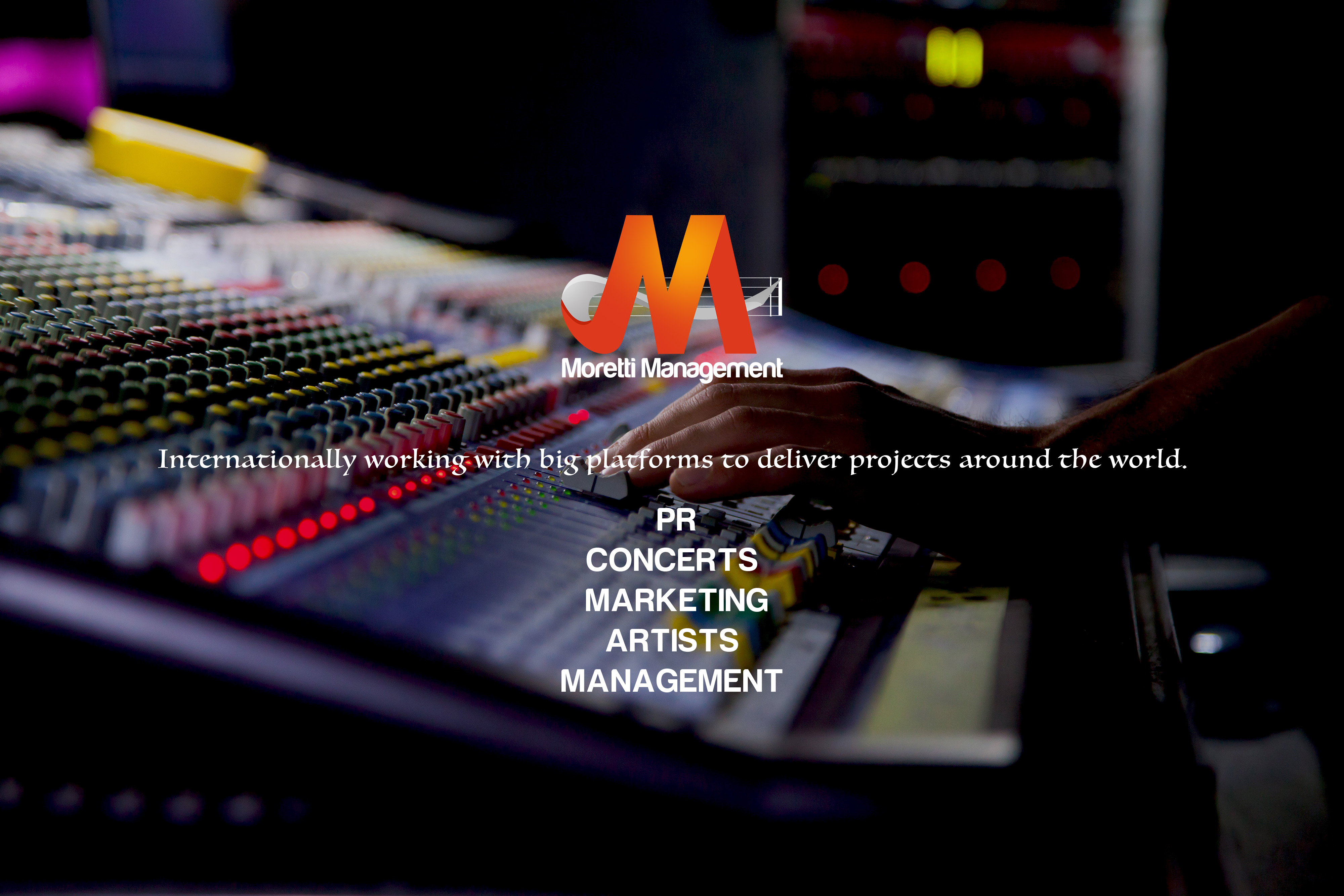 Soundman working on the mixing console.